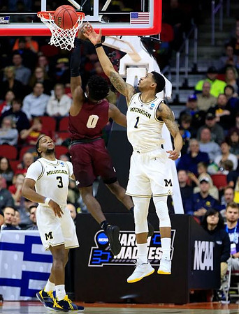 Zavier Simpson (3) and Charles Matthews (1)