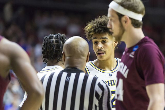 Zavier Simpson (3) and Jordan Poole (2)