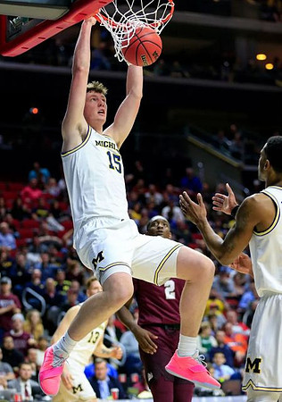 Jon Teske (15), Charles Matthews (1), and Ignas Brazdeikis (13)