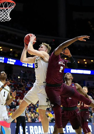 Charles Matthews (1) and Ignas Brazdeikis (13)