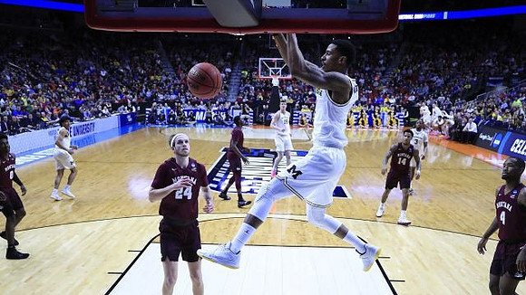 Charles Matthews (1), Eli Brooks (55), Jon Teske (15), and Zavier Simpson (3)