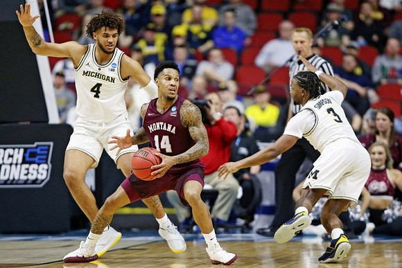 Isaiah Livers (4) and Zavier Simpson (3)