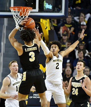 Ignas Brazdeikis (13) and Jordan Poole (2)
