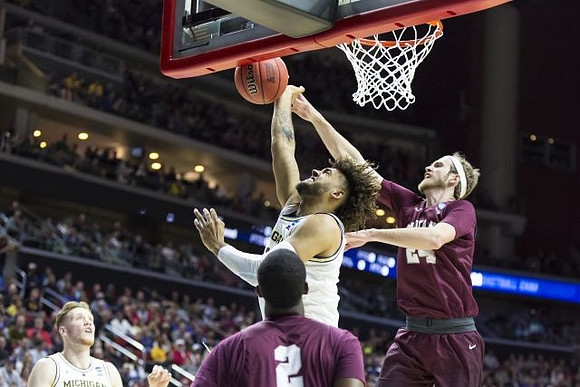 Ignas Brazdeikis (13) and Isaiah Livers (4)