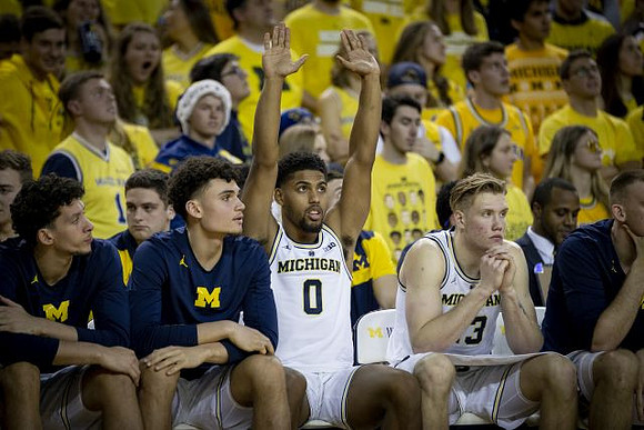 Brandon Johns Jr. (23), Adrien Nunez (5), David DeJulius (0), Ignas Brazdeikis (13), and Austin Davis (51)