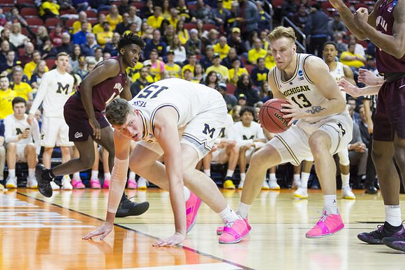 Jon Teske (15), Ignas Brazdeikis (13), and Charles Matthews (1)