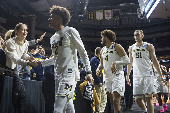 Isaiah Livers (4), Austin Davis (51), and David DeJulius (0)