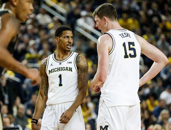 Charles Matthews (1) and Jon Teske (15)