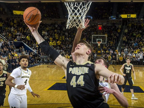 Jon Teske (15) and Isaiah Livers (4)