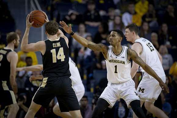 Charles Matthews (1) and Jon Teske (15)
