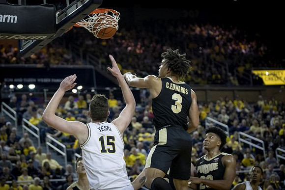 Jon Teske (15) and Charles Matthews (1)