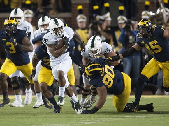 Rashan Gary (3), Bryan Mone (90), and Chase Winovich (15)