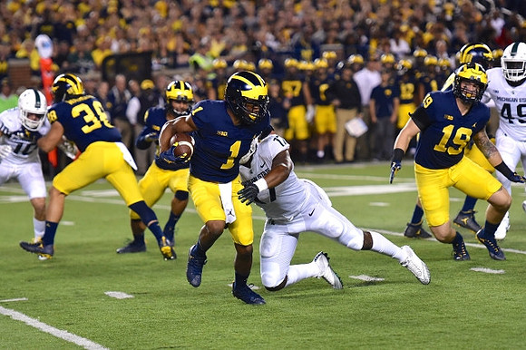 Jared Wangler (38), John O'Korn (8), Kekoa Crawford (1), and Henry Poggi (19)