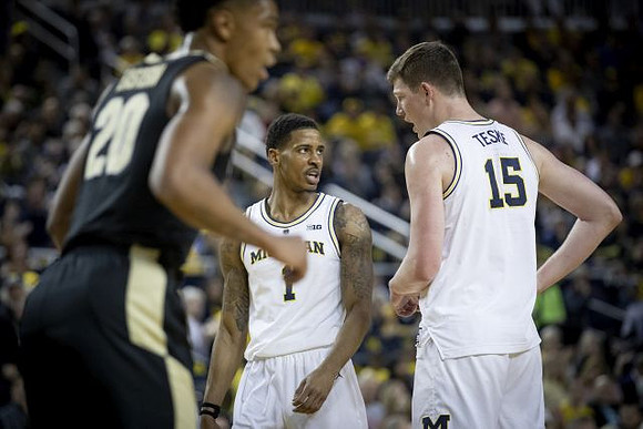 Charles Matthews (1) and Jon Teske (15)