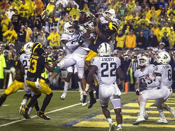 Donovan Peoples-Jones (9), Eddie McDoom (13), and Kekoa Crawford (1)
