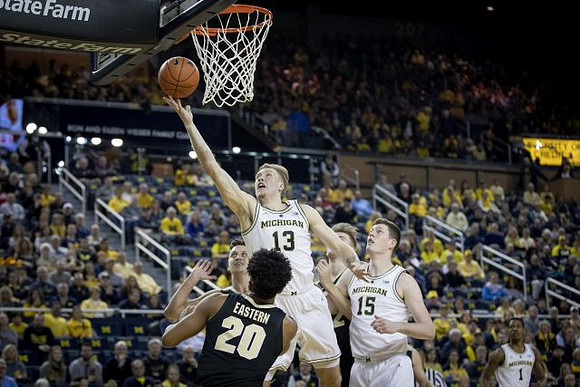 Ignas Brazdeikis (13), Jon Teske (15), and Charles Matthews (1)