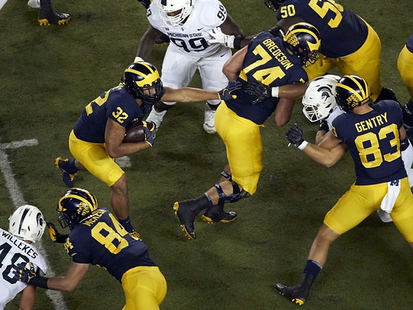 Sean McKeon (84), Ty Isaac (32), Ben Bredeson (74), Zach Gentry (83), and Michael Onwenu (50)