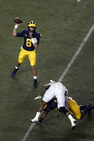 John O'Korn (8) and Karan Higdon (22)