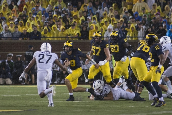 John O'Korn (8), Patrick Kugler (57), Michael Onwenu (50), Juwann Bushell-Beatty (76), and Chris Evans (12)