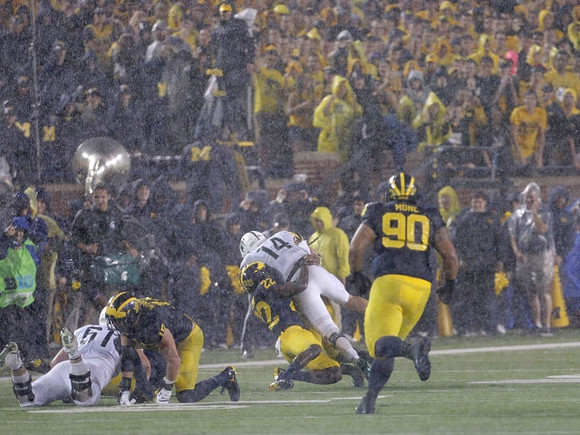Chase Winovich (15), David Long (22), and Bryan Mone (90)