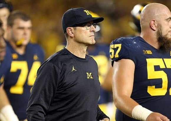 Jim Harbaugh and Patrick Kugler (57)