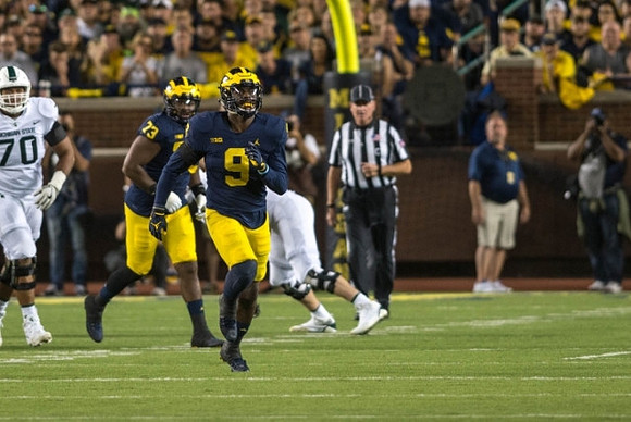 Mike McCray (9) and Maurice Hurst (73)