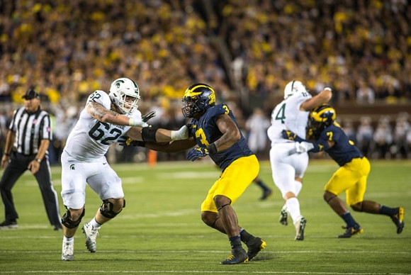 Rashan Gary (3) and Khaleke Hudson (7)