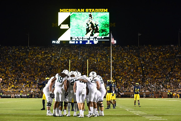 Devin Bush (10) and Josh Metellus (14)