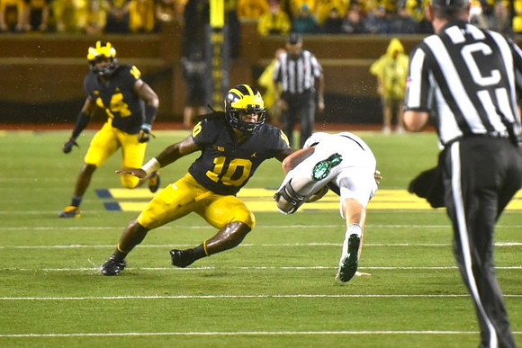 Josh Metellus (14) and Devin Bush (10)