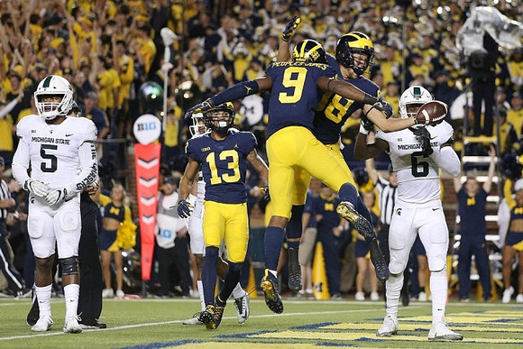 Eddie McDoom (13), Donovan Peoples-Jones (9), and Grant Perry (88)