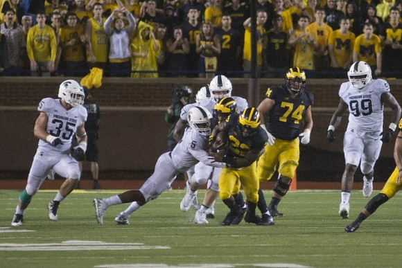 Karan Higdon (22) and Ben Bredeson (74)