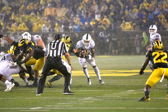 Bryan Mone (90), Maurice Hurst (73), Chase Winovich (15), and David Long (22)