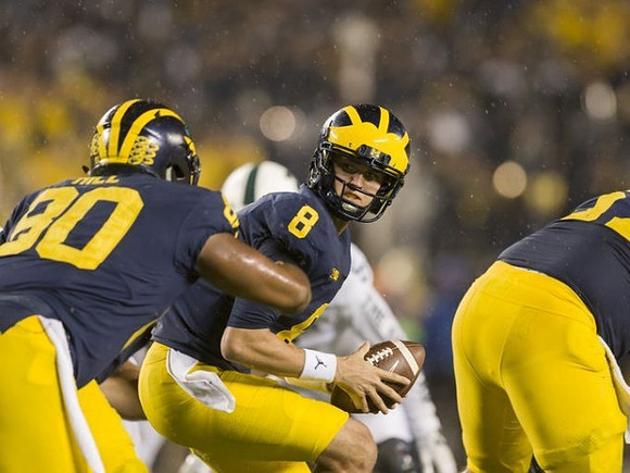 Khalid Hill (80) and John O'Korn (8)