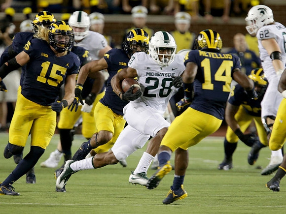Chase Winovich (15) and Josh Metellus (14)