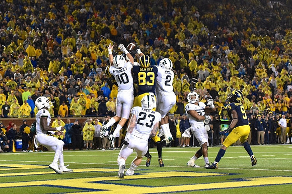 Zach Gentry (83) and Donovan Peoples-Jones (9)