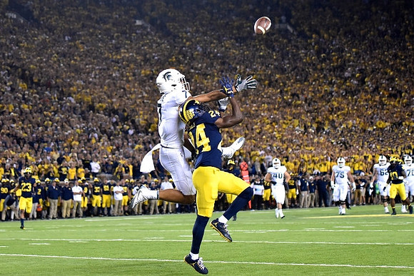 Lavert Hill (24), Tyree Kinnel (23), and Devin Bush (10)