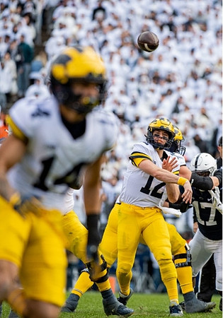 Roman Wilson (14) and Cade McNamara (12)