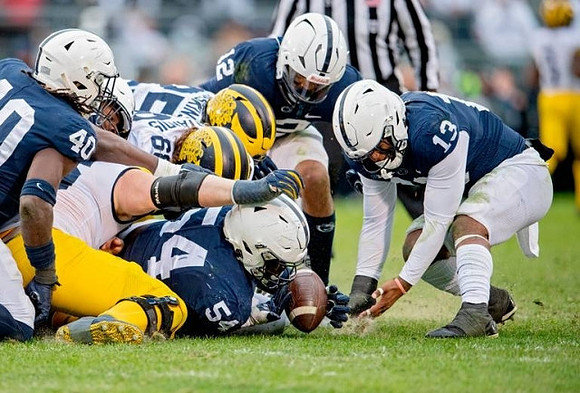 Andrew Vastardis (68) and Hassan Haskins (25)