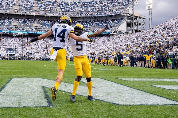 Roman Wilson (14) and Mike Sainristil (5)