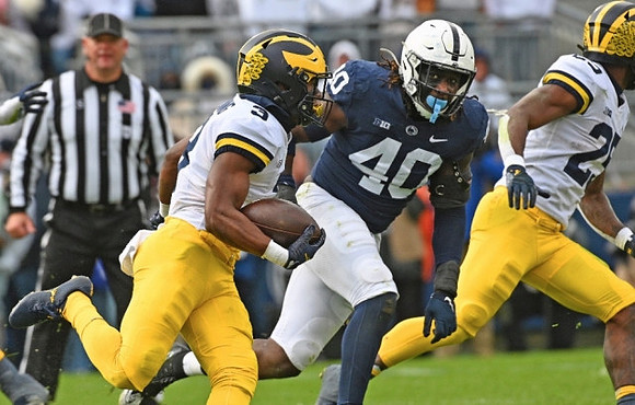 A.J. Henning (3) and Junior Colson (25)