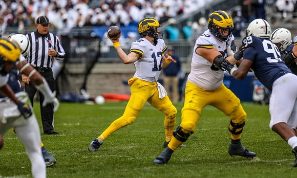 Cade McNamara (12) and Zak Zinter (65)