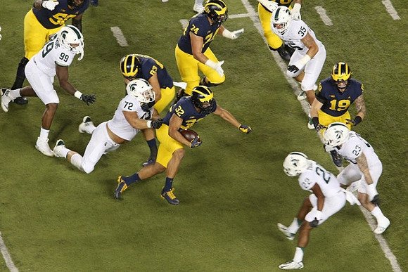 Michael Onwenu (50), Zach Gentry (83), Ty Isaac (32), Ben Bredeson (74), and Henry Poggi (19)