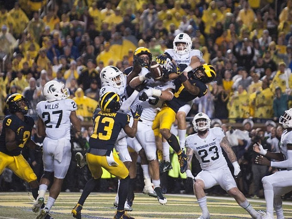 Donovan Peoples-Jones (9), Eddie McDoom (13), and Kekoa Crawford (1)