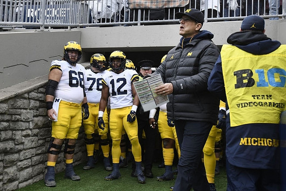 Andrew Vastardis (68), Ryan Hayes (76), Josh Ross (12), and Jim Harbaugh