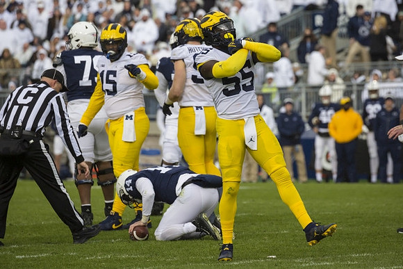 Christopher Hinton (15), Aidan Hutchinson (97), and David Ojabo (55)