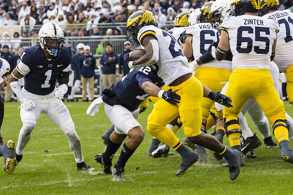 Hassan Haskins (25), Andrew Vastardis (68), Zak Zinter (65), and Andrew Stueber (71)