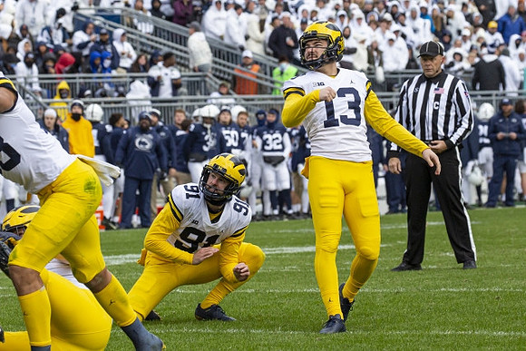 Brad Robbins (91) and Jake Moody (13)