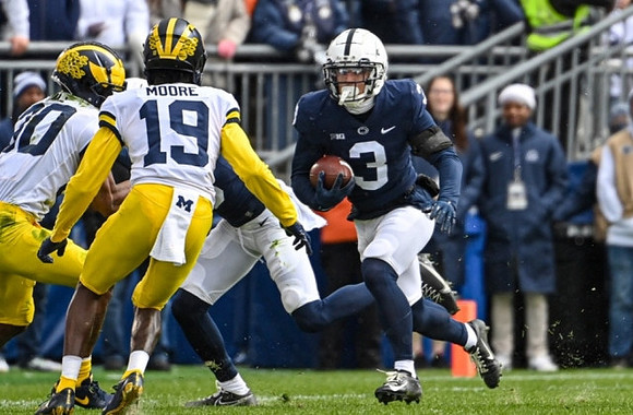 Daxton Hill (30) and Rod Moore (19)