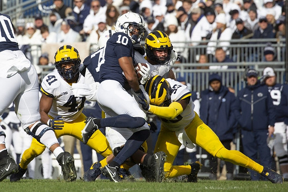 Nikhai Hill-Green (41), Aidan Hutchinson (97), and David Ojabo (55)