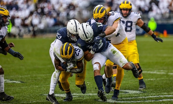 Hassan Haskins (25), Joel Honigford (84), and Andrew Vastardis (68)